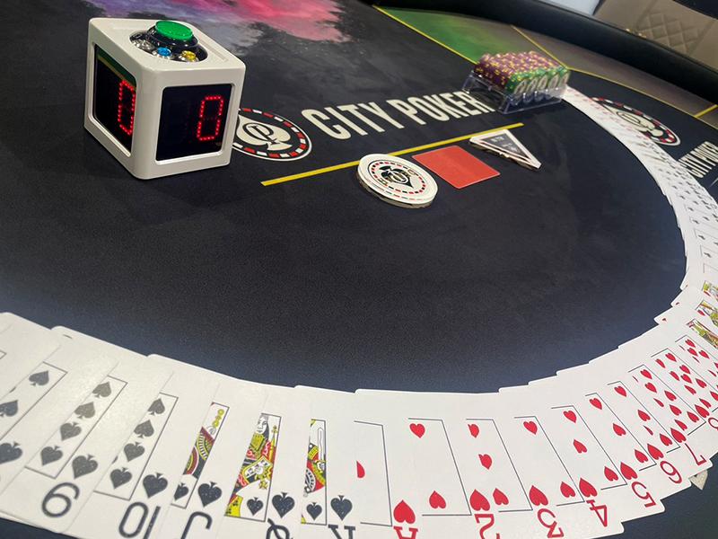 在锦标赛中生存比赢下底池更重要